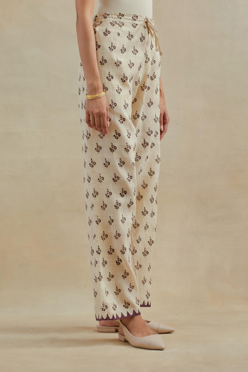 Beige Cotton straight pants with all-over small booti hand block print.