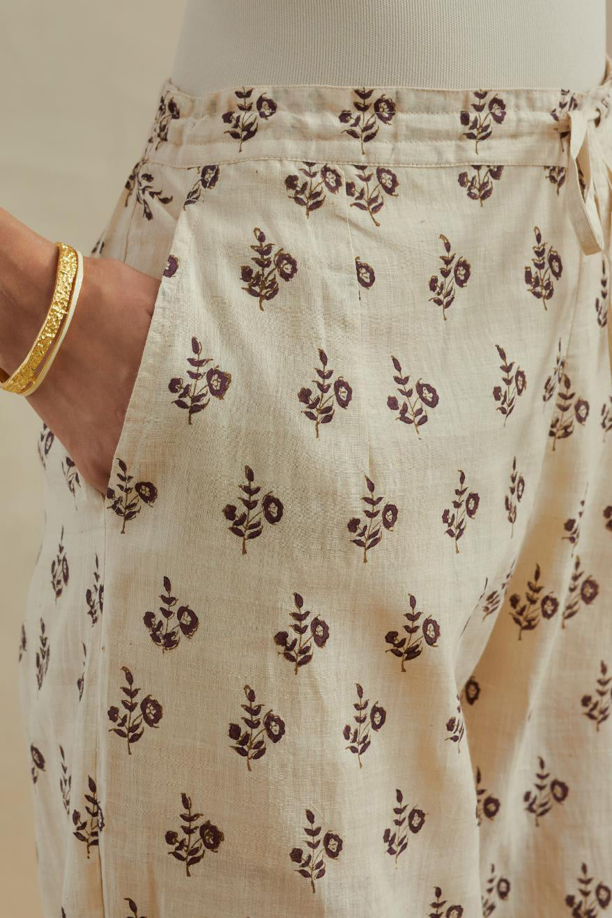 Beige Cotton straight pants with all-over small booti hand block print.