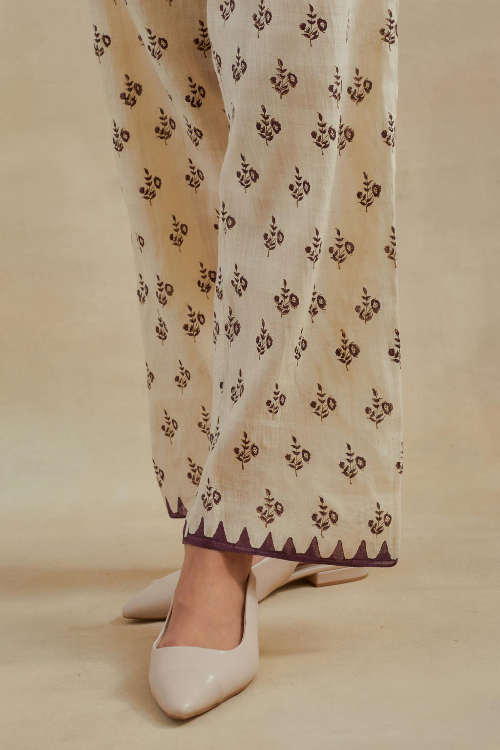 Beige Cotton straight pants with all-over small booti hand block print.