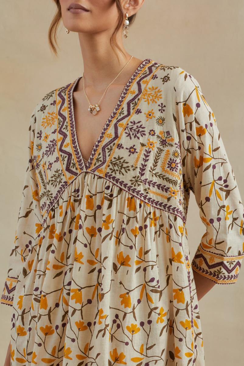 Beige cotton kurta dress set with all-over yellow & purple floral hand block print.