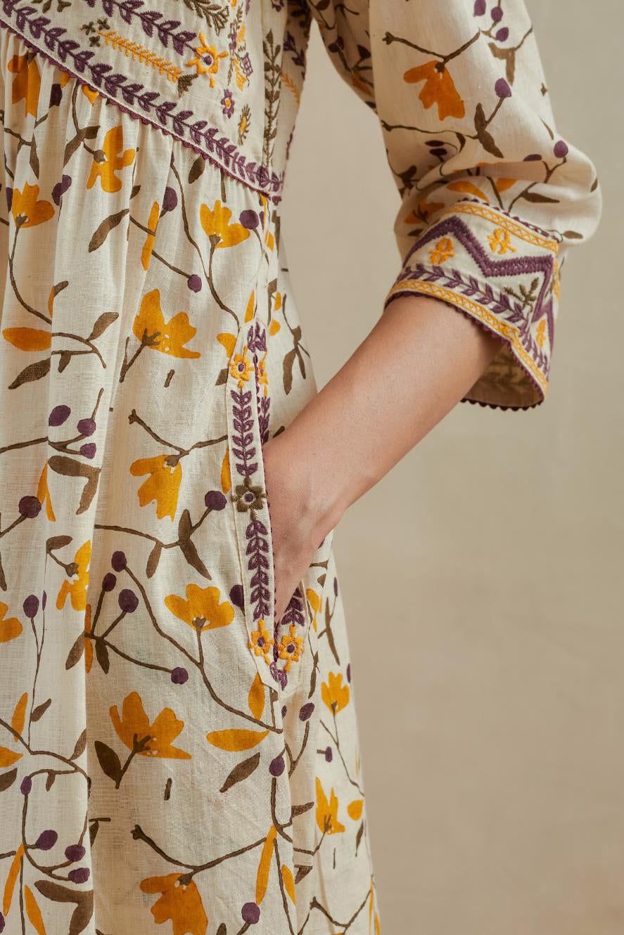 Beige cotton kurta dress set with all-over yellow & purple floral hand block print.