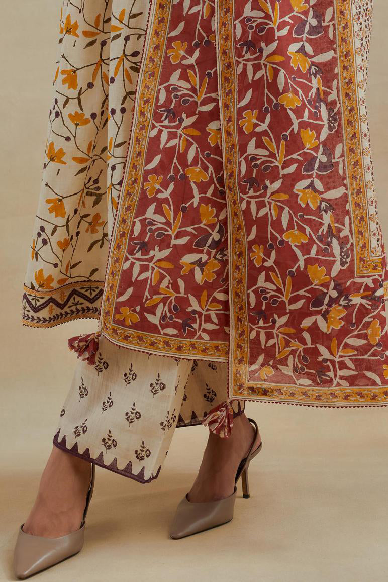 Beige cotton kurta dress set with all-over yellow & purple floral hand block print.