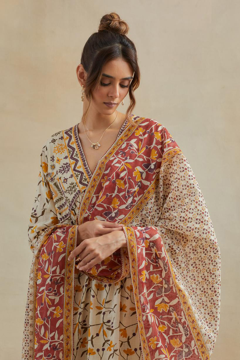 Beige cotton kurta dress set with all-over yellow & purple floral hand block print.