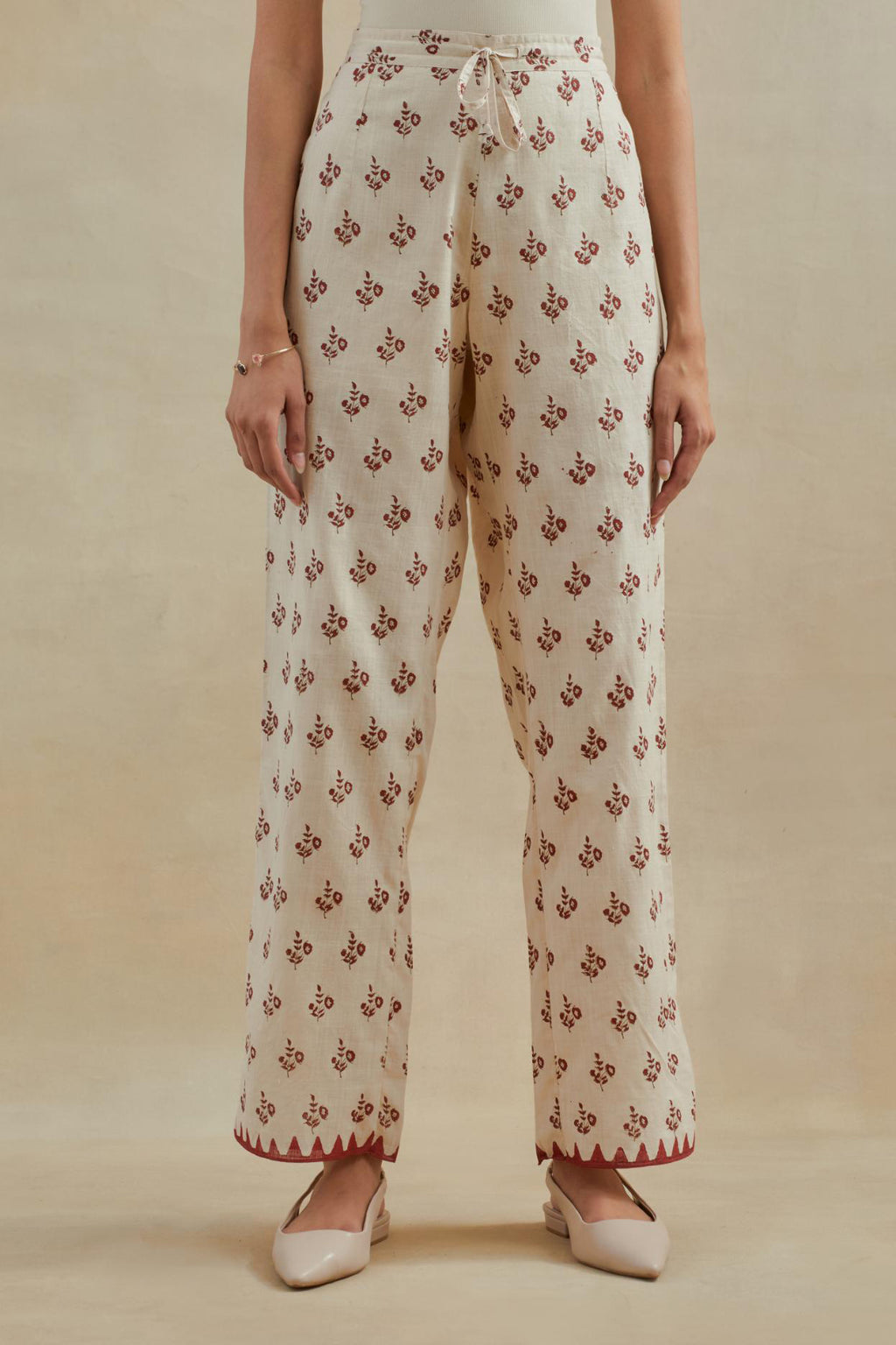 Beige Cotton straight pants with all-over small booti hand block print.
