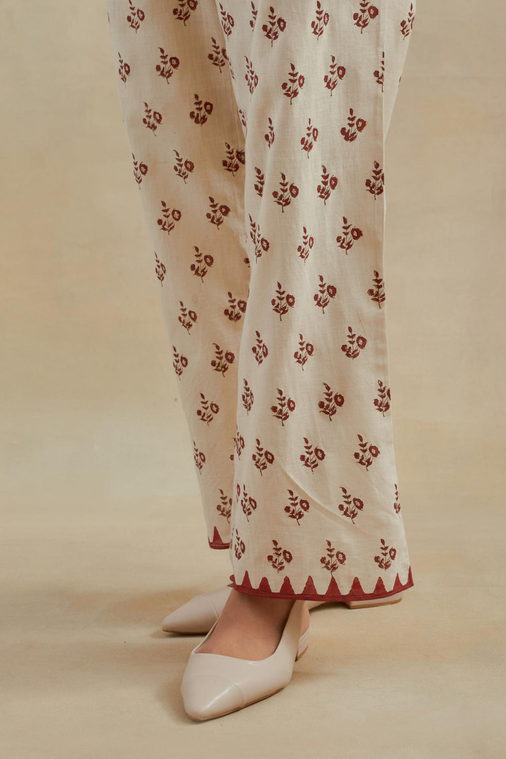 Beige Cotton straight pants with all-over small booti hand block print.