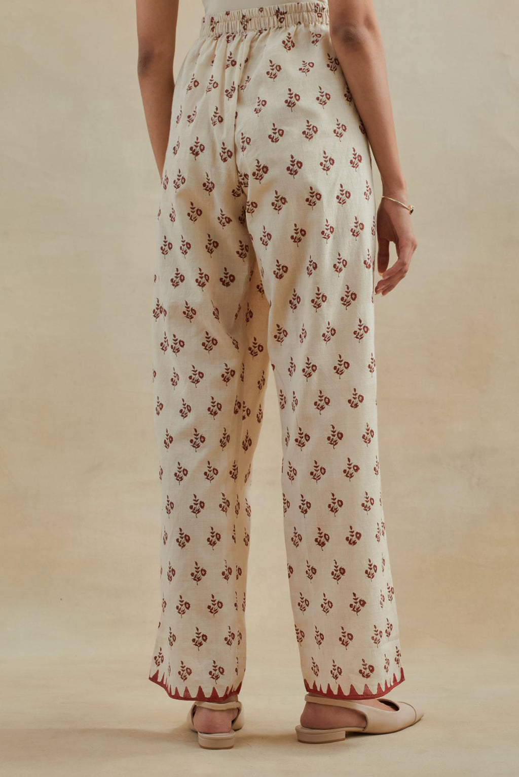 Beige Cotton straight pants with all-over small booti hand block print.
