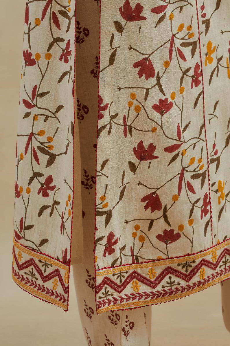 Beige cotton straight kurta set with all-over yellow & red colored flower hand block print & and side panels.