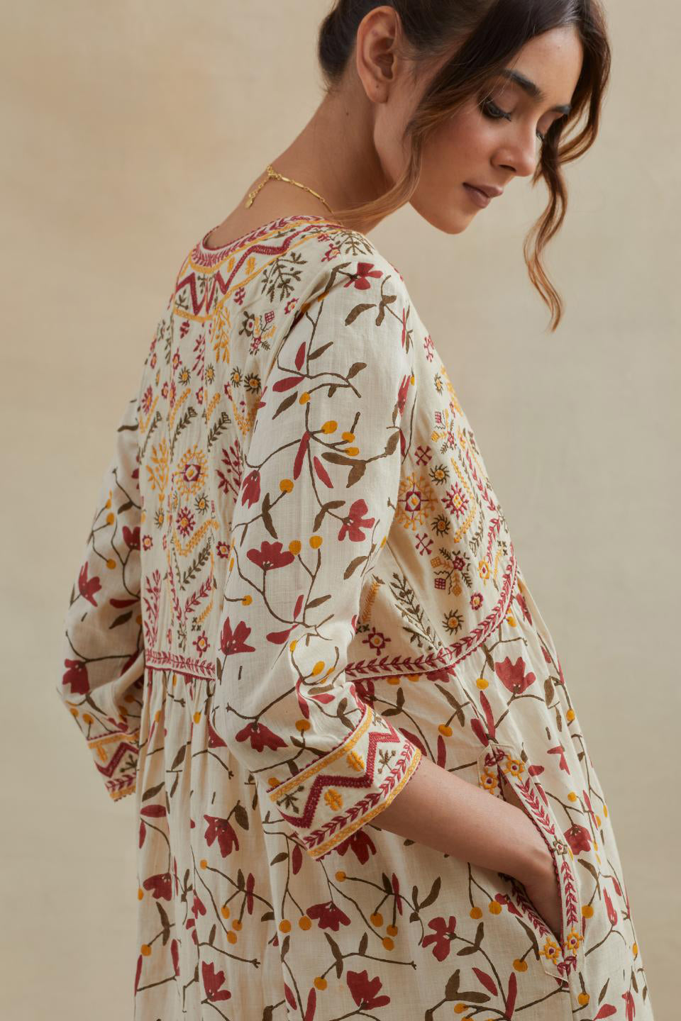Beige cotton kurta dress set with all-over yellow & red floral hand block print.