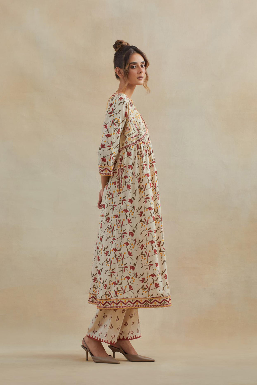 Beige cotton kurta dress set with all-over yellow & red floral hand block print.