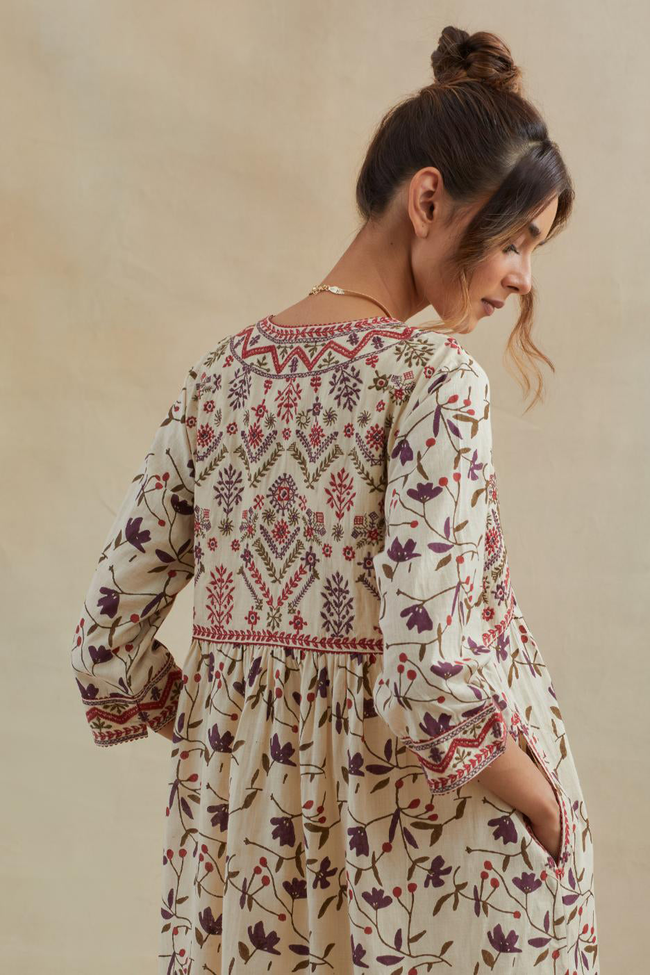 Beige cotton kurta dress set with all-over rust & green floral hand block print.