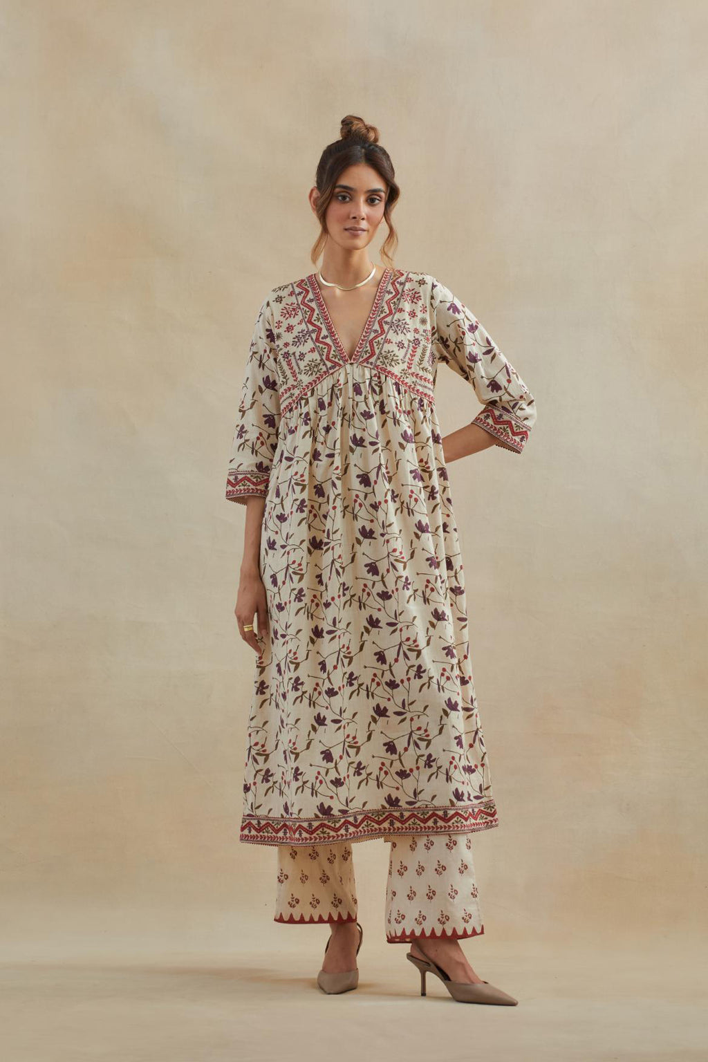 Beige cotton kurta dress set with all-over rust & green floral hand block print.