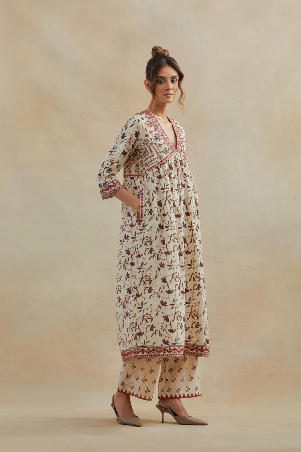 Beige cotton kurta dress set with all-over rust & green floral hand block print.
