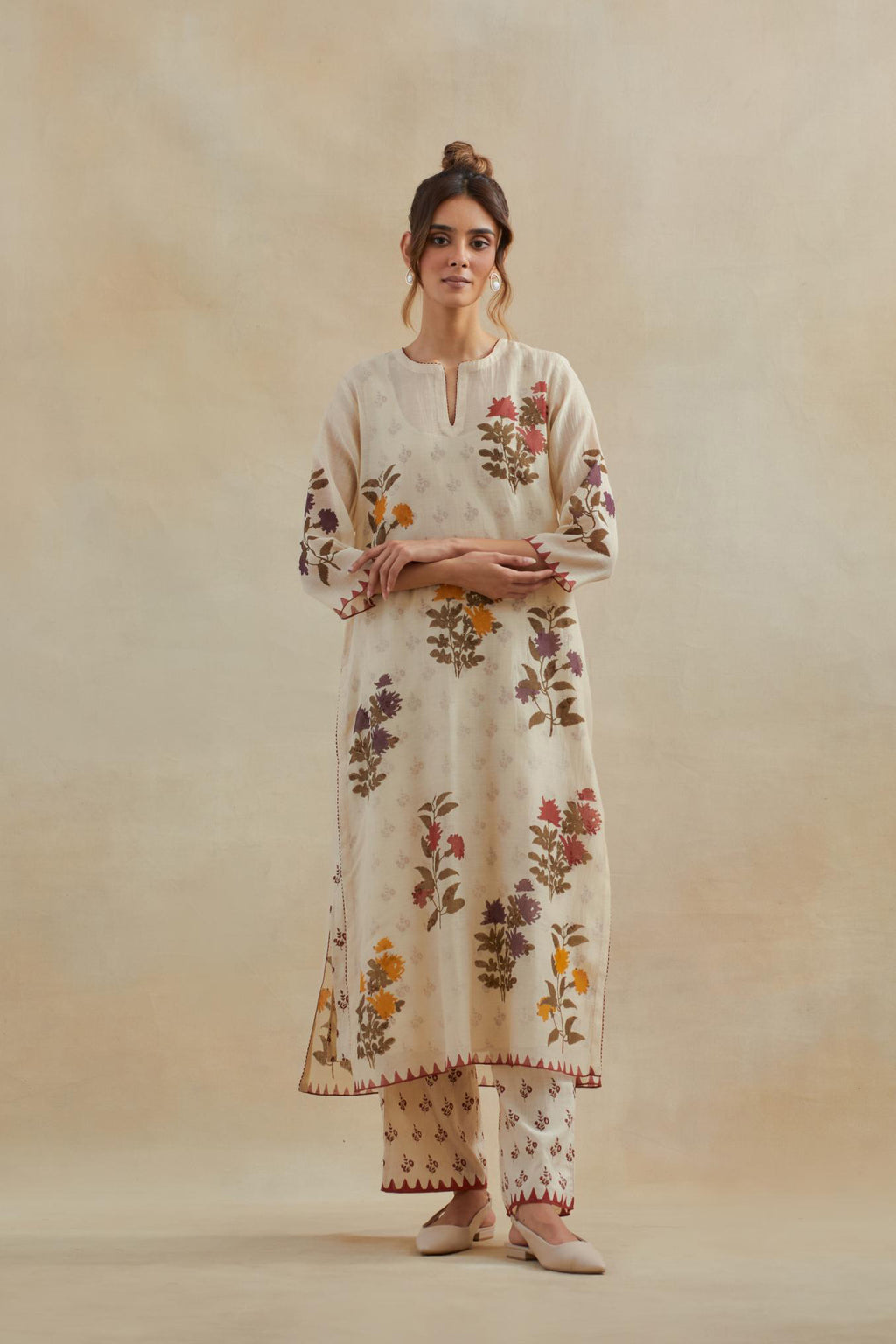 Beige cotton chanderi straight kurta set with all-over multi colored floral hand block print.