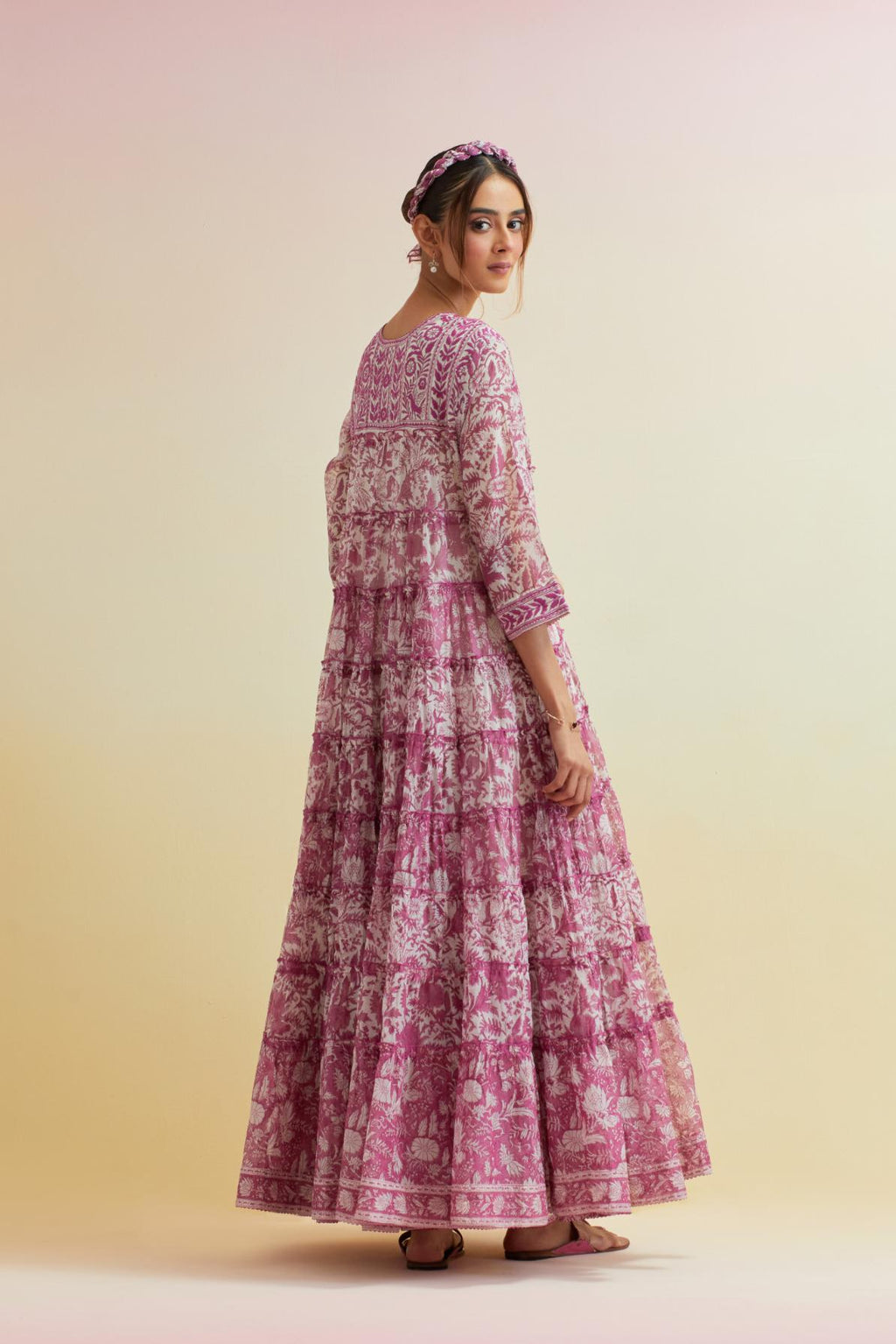 Orchid pink hand block printed multi-tiered kurta dress set with 3/4 sleeves, highlighted with thread embroidered yoke in front and back.