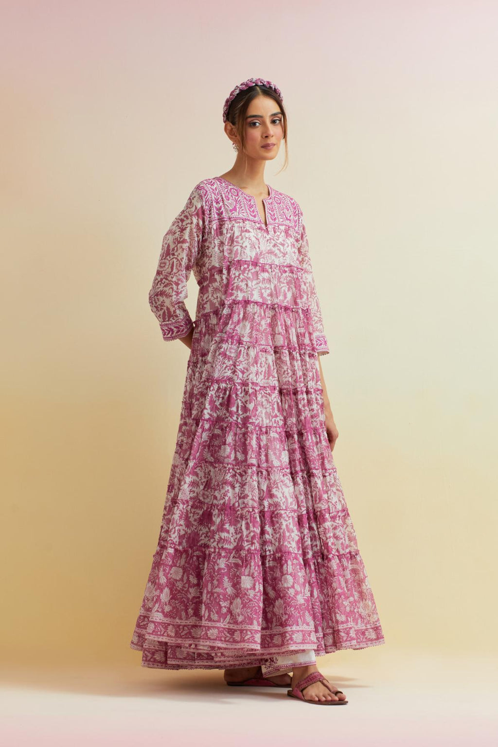 Orchid pink hand block printed multi-tiered kurta dress set with 3/4 sleeves, highlighted with thread embroidered yoke in front and back.