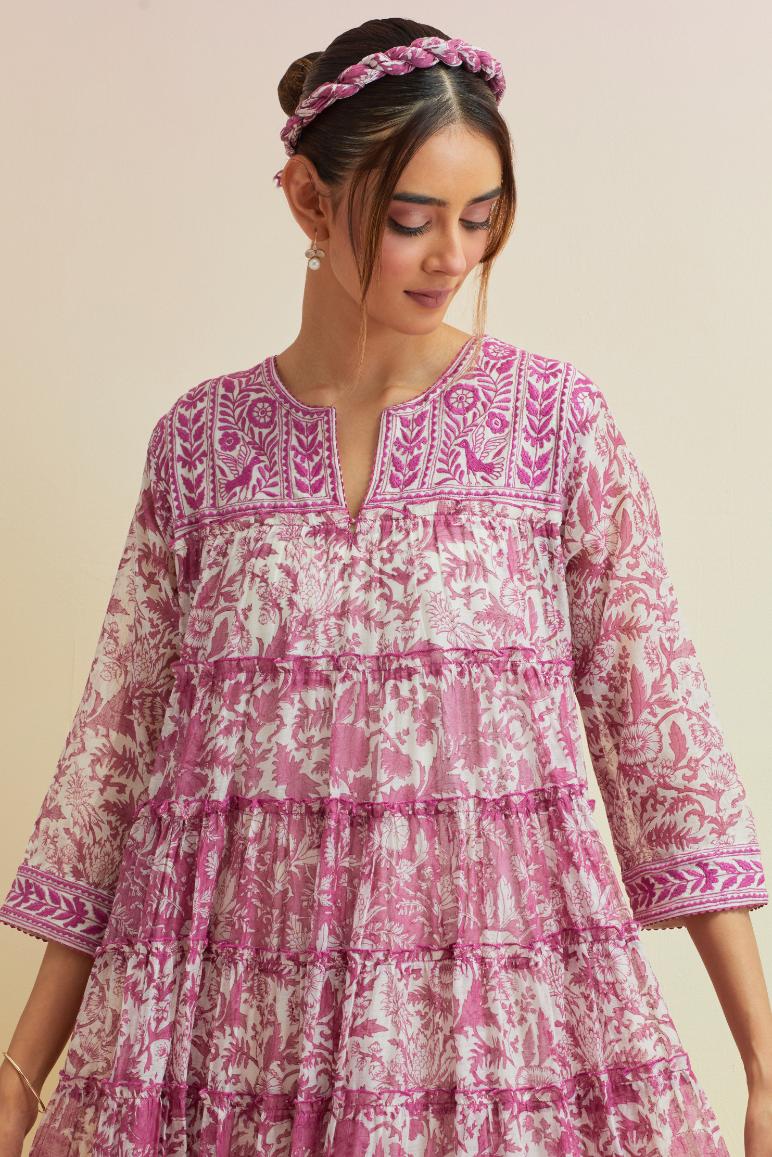 Orchid pink hand block printed multi-tiered kurta dress set with 3/4 sleeves, highlighted with thread embroidered yoke in front and back.