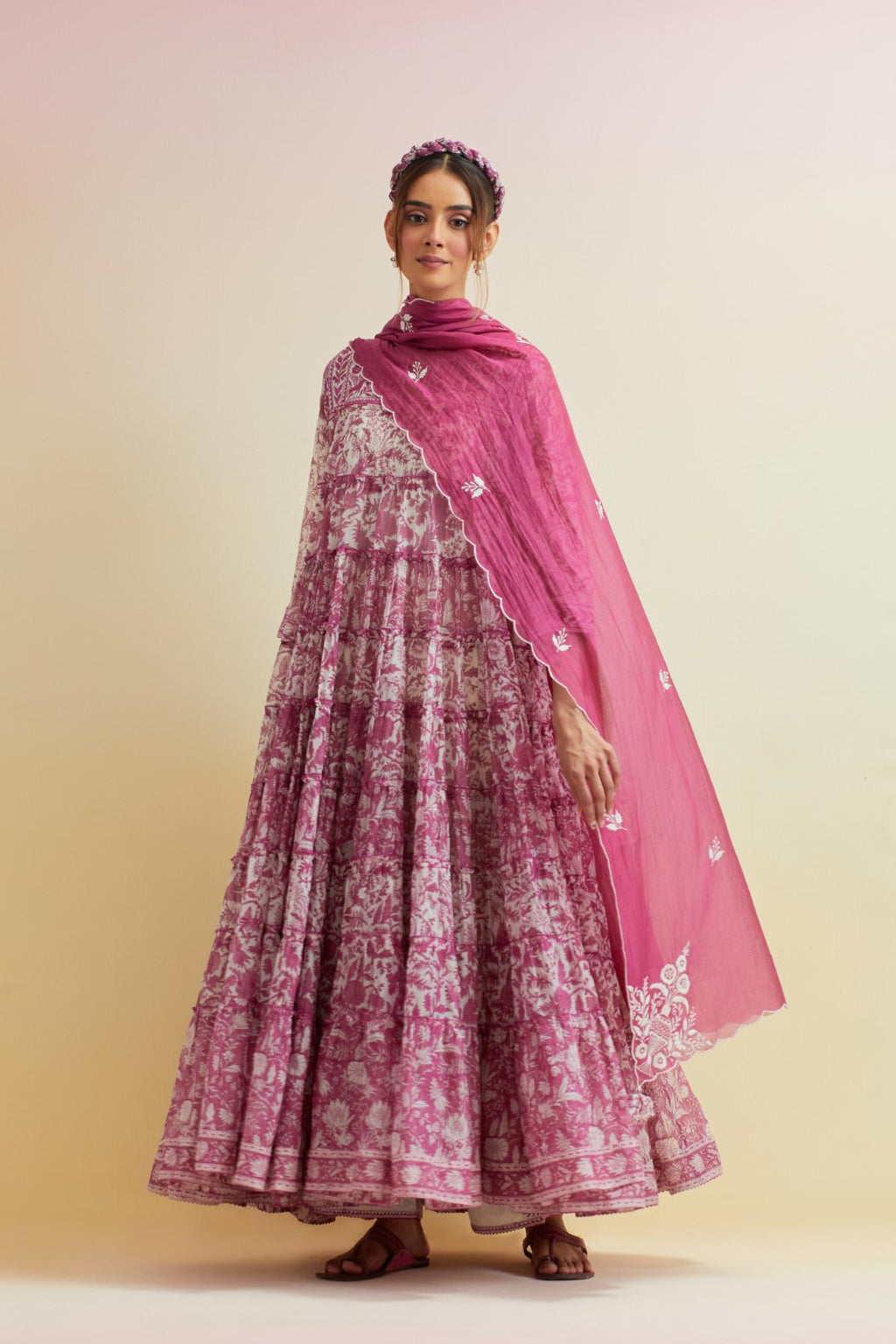 Orchid pink hand block printed multi-tiered kurta dress set with 3/4 sleeves, highlighted with thread embroidered yoke in front and back.