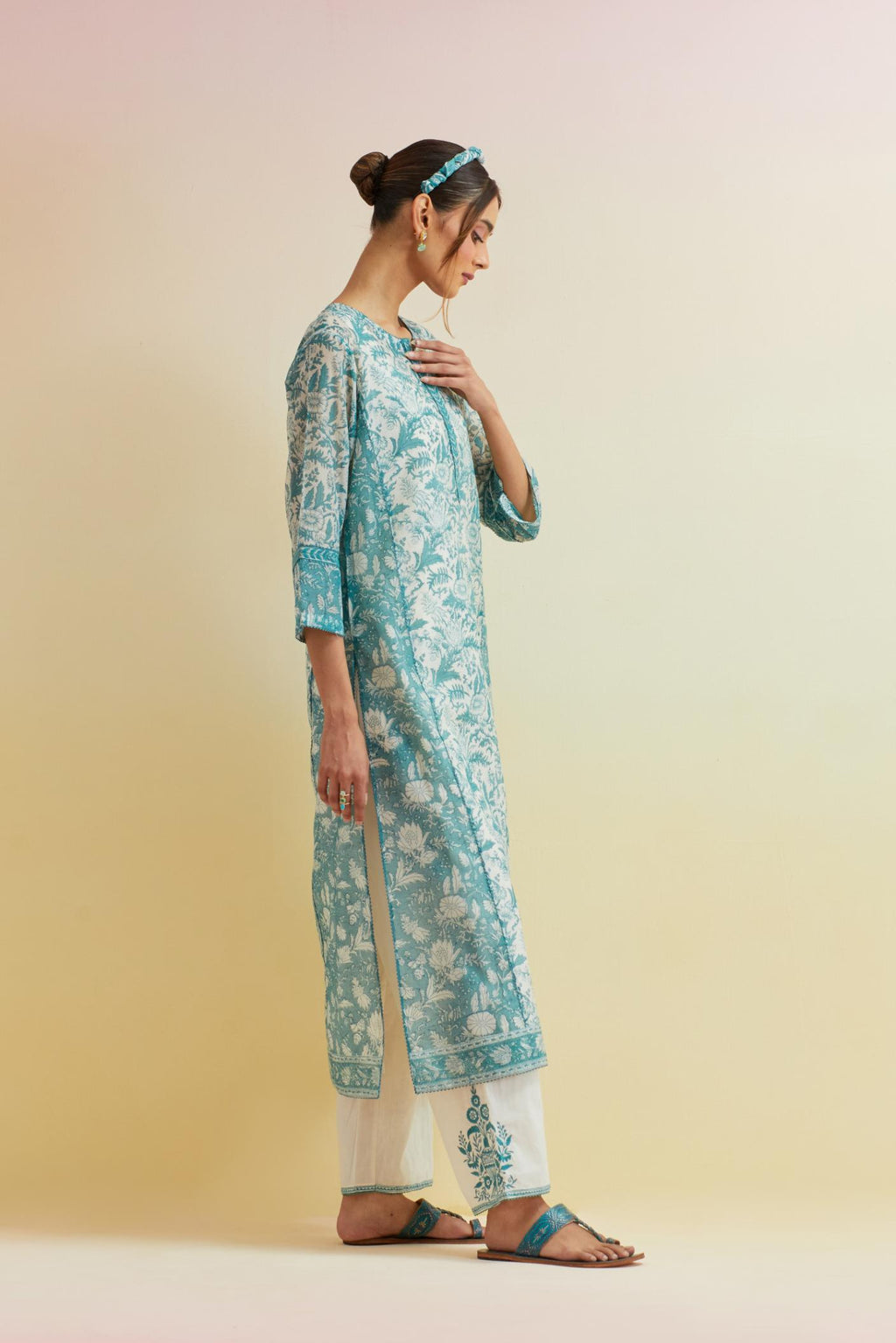 Tropical teal hand block printed kalidar straight kurta set, highlighted with thread embroidery.