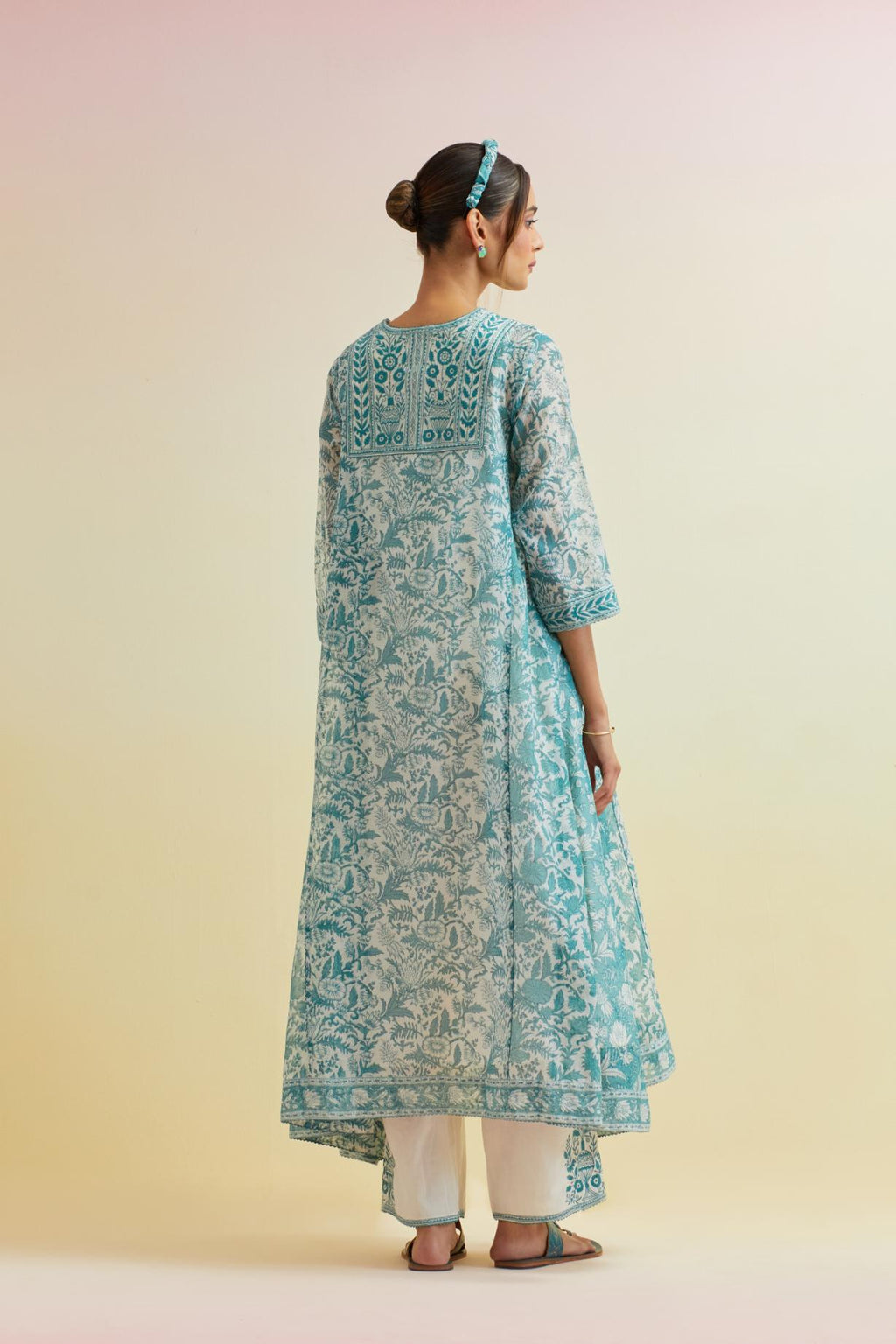 Tropical teal A-line hand block printed long kurta set with thread embroidered yoke and side kalis.