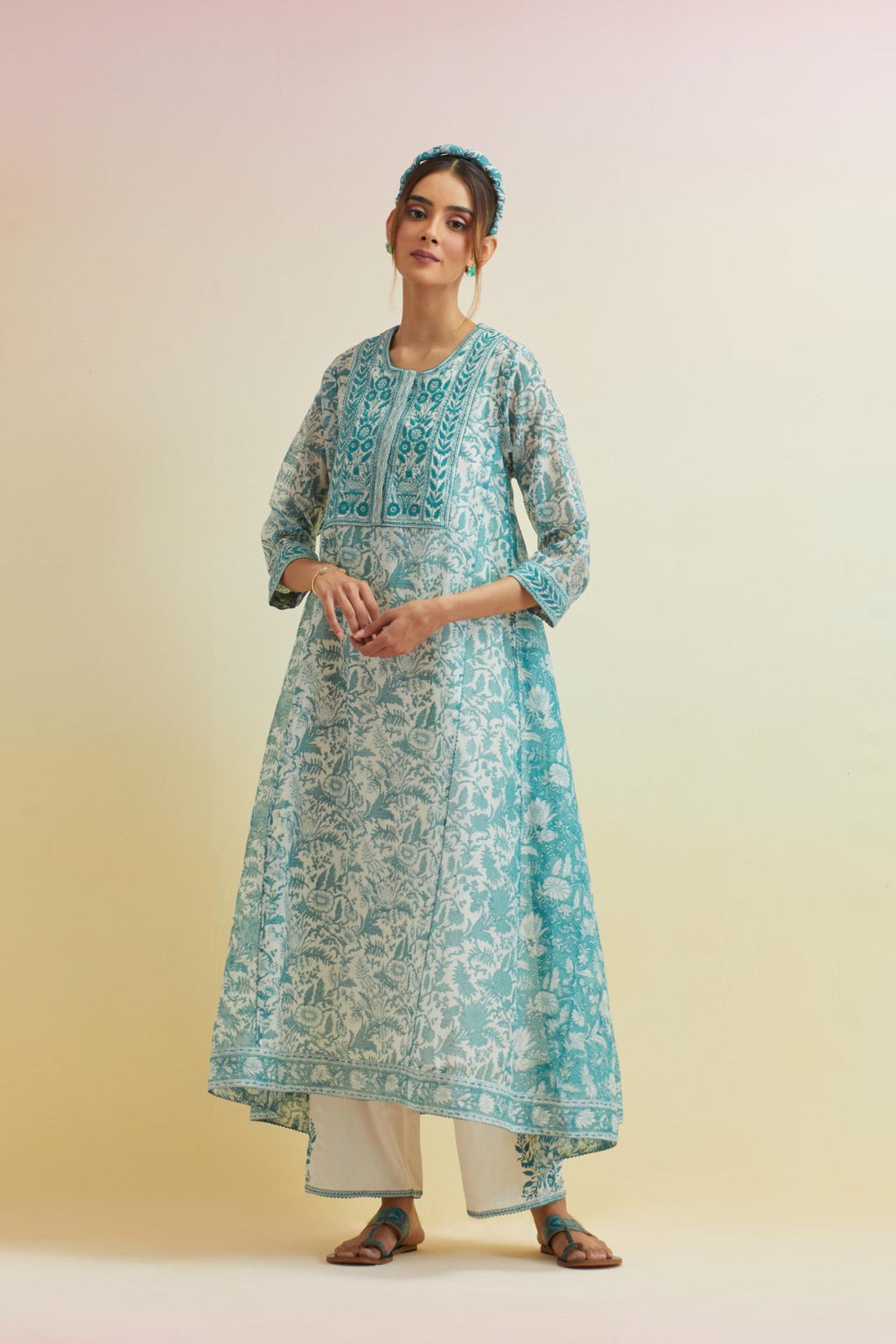 Tropical teal A-line hand block printed long kurta set with thread embroidered yoke and side kalis.