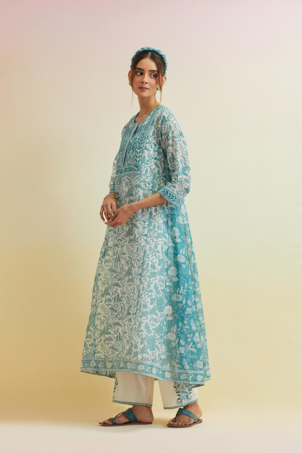 Tropical teal A-line hand block printed long kurta set with thread embroidered yoke and side kalis.