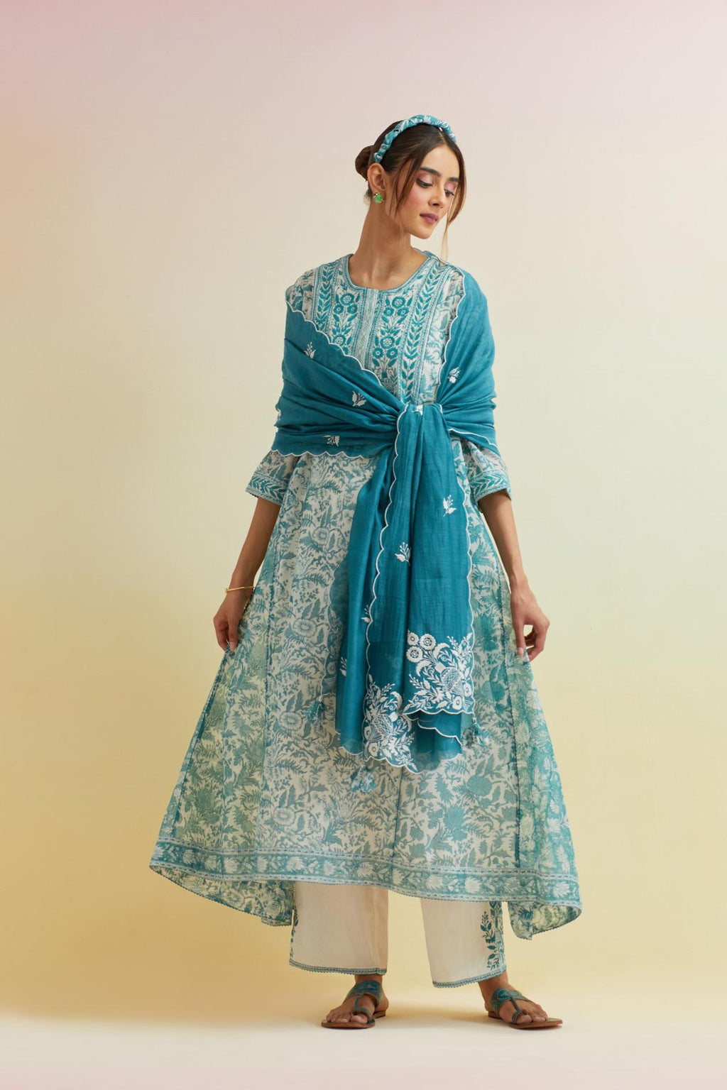 Tropical teal A-line hand block printed long kurta set with thread embroidered yoke and side kalis.