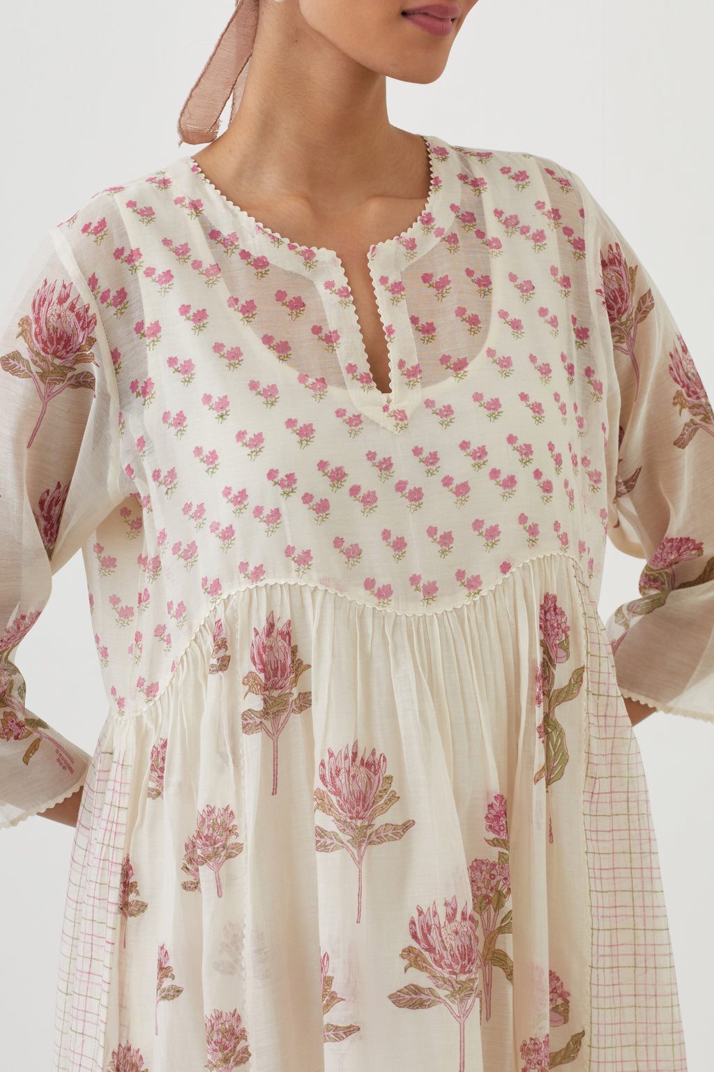 Off white cotton chanderi Kurta dress set  with all-over assorted pink colored floral hand block print.