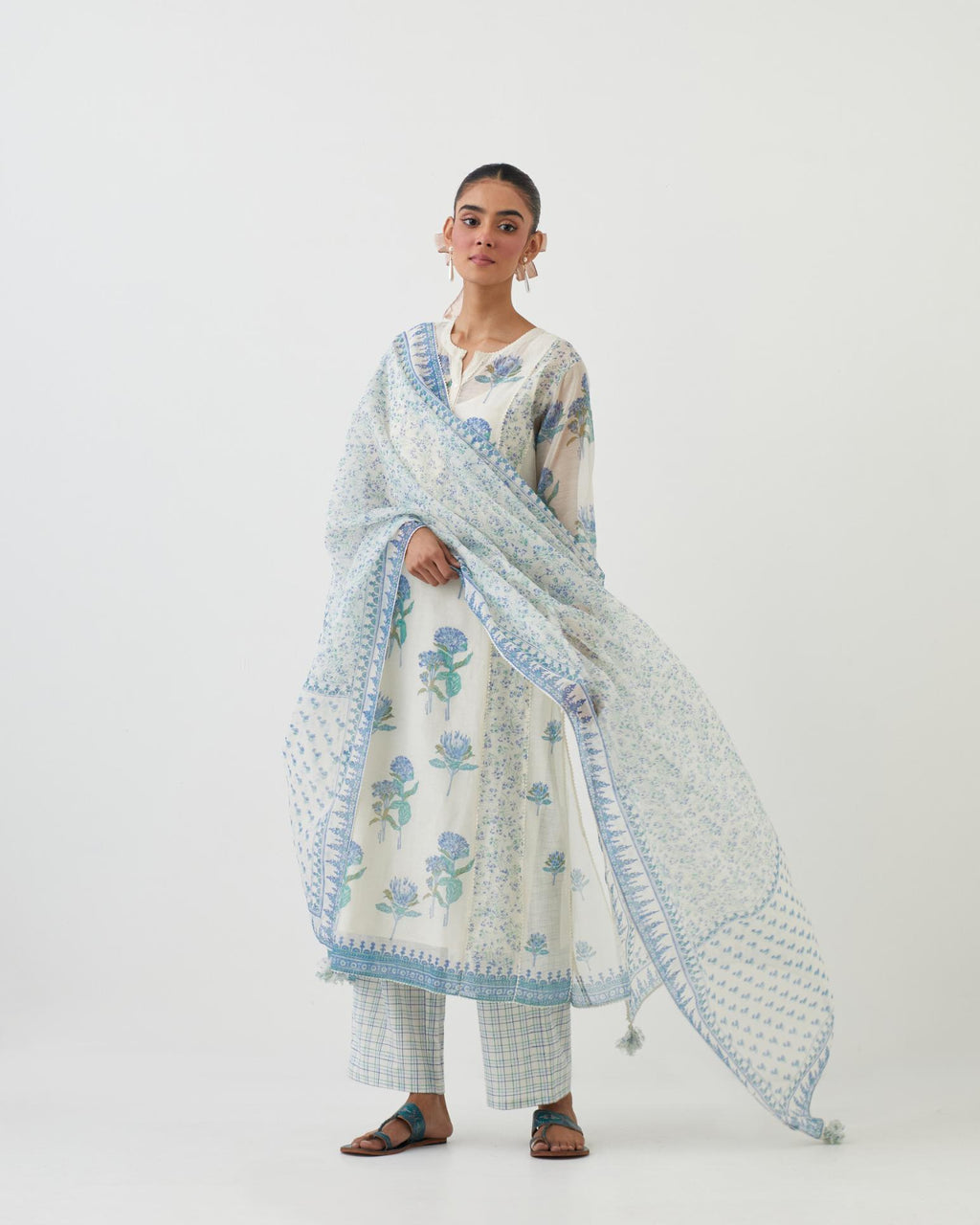 Off white cotton chanderi hand-block printed kurta set with multi-print panels, highlighted with off white ricrac.