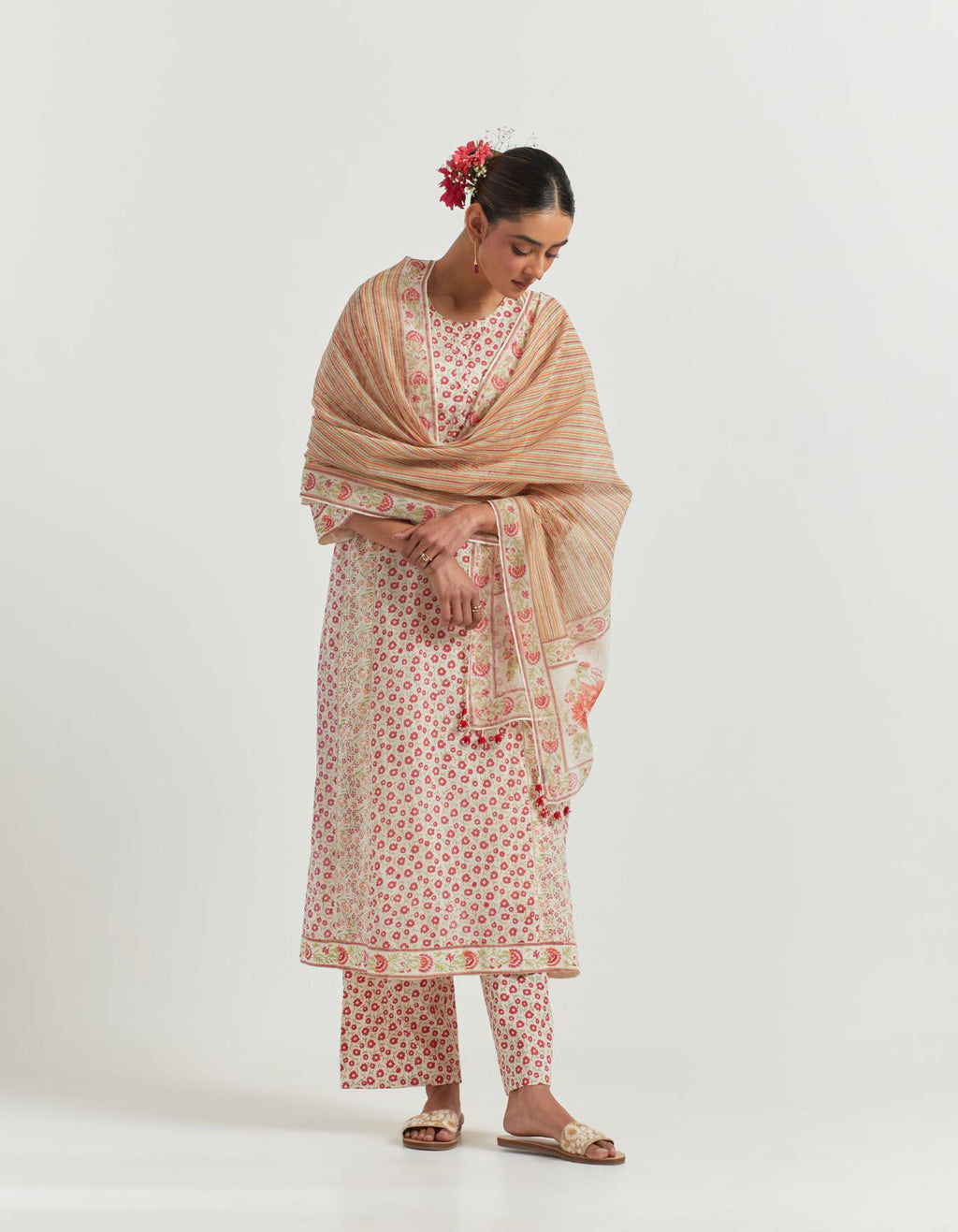 Multi colored cotton hand-block printed kurta set with multi-print panels, highlighted with off white ladder lace detailing at side panels.