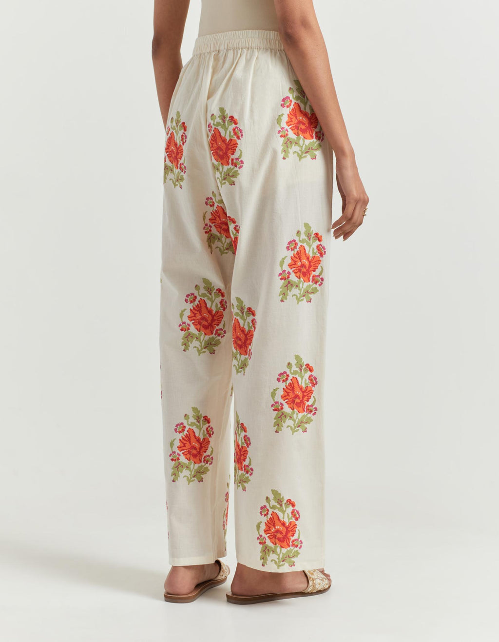 Cotton straight pants with all-over big floral boota hand block print.