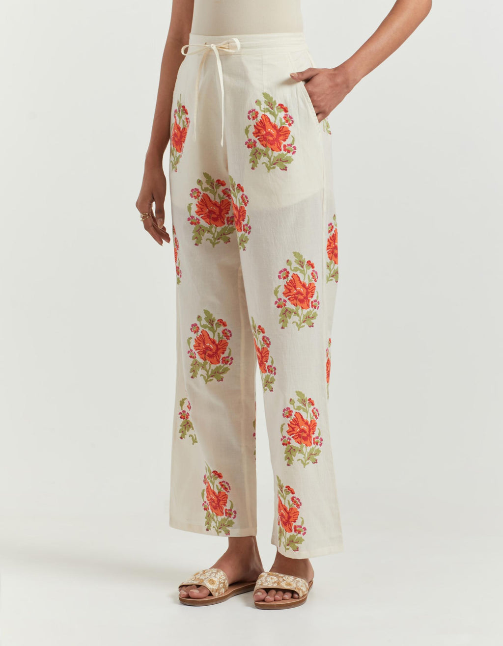 Cotton straight pants with all-over big floral boota hand block print.