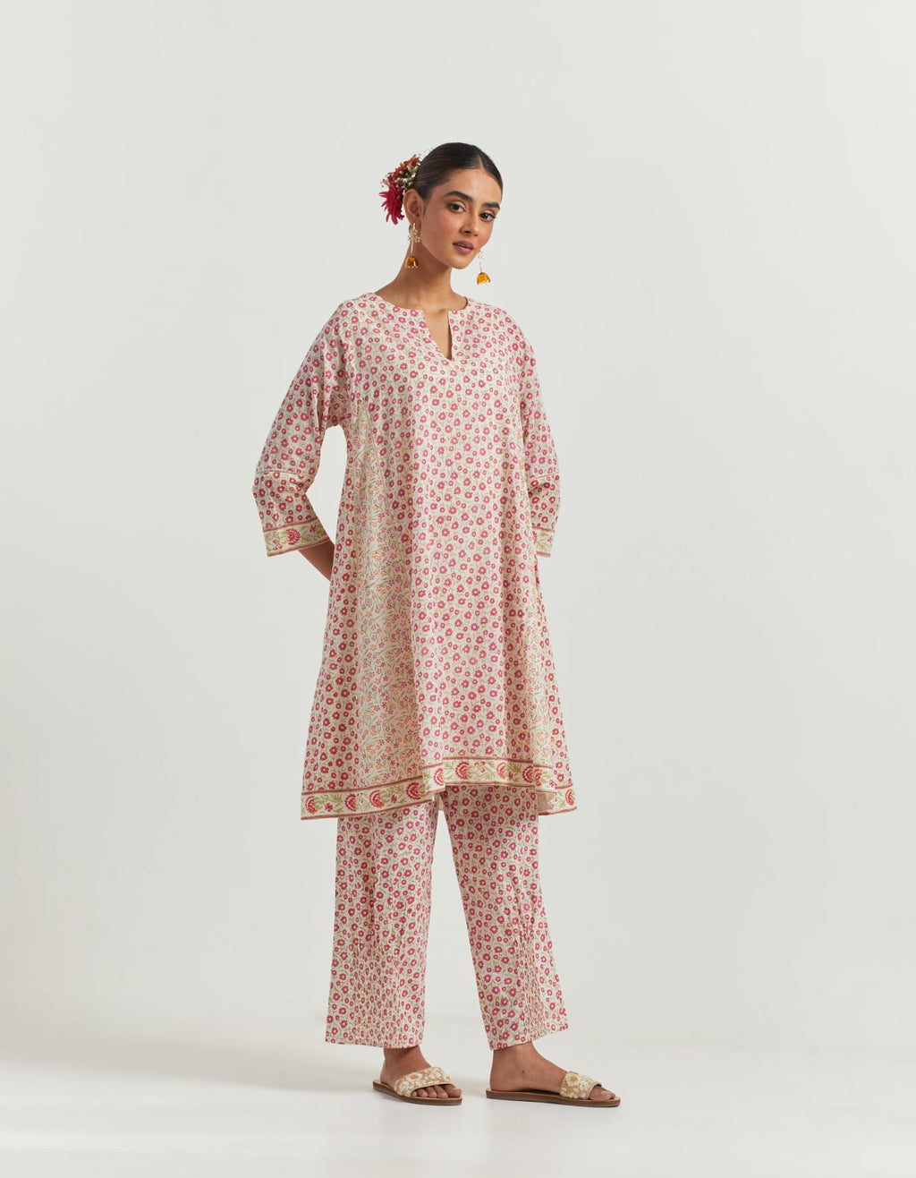 Multi colored hand block printed short kalidar cotton kurta set, detailed with off white ladder lace.