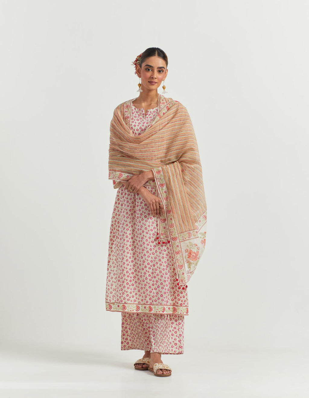 Multi colored cotton hand-block printed kurta set with side panels, detailed with off white ladder lace detailing at side panels.