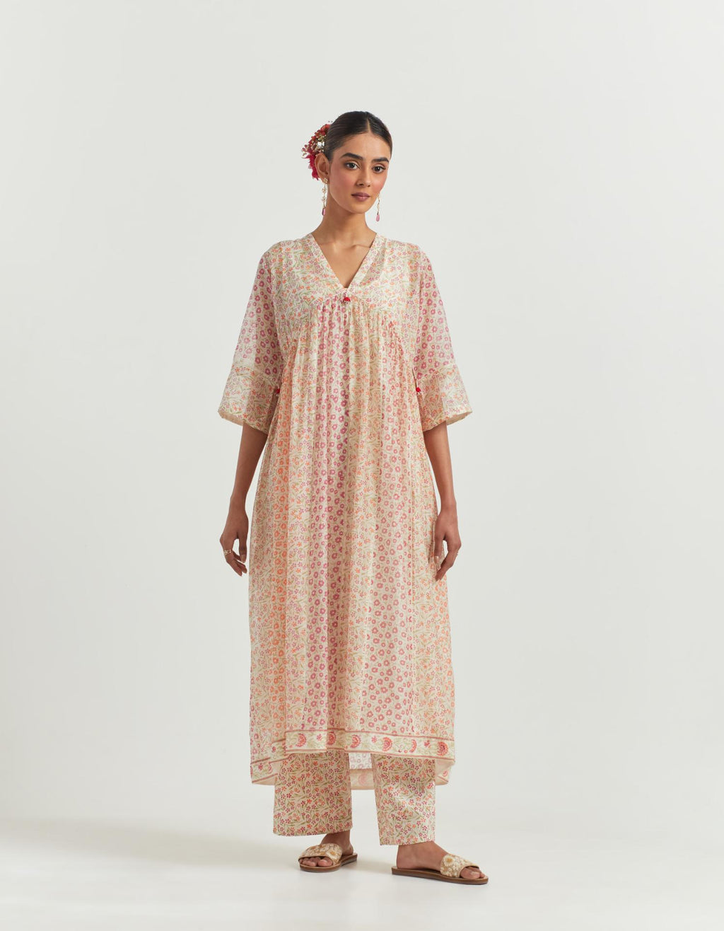 Multi colored hand block printed cotton chanderi kurta dress set with V neck, yoke and fine gathers at empire line.