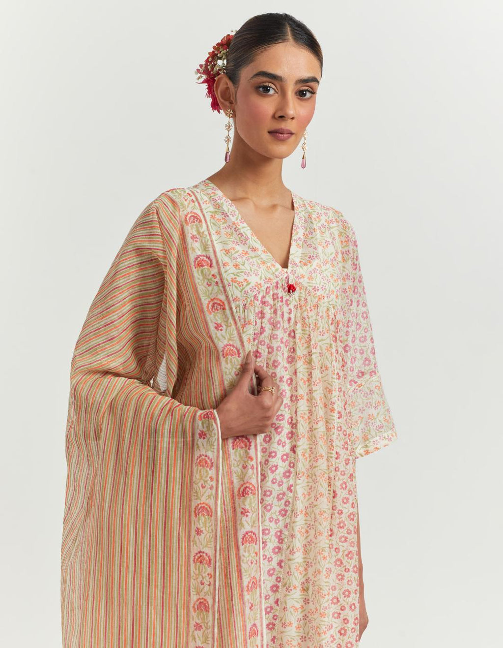 Multi colored hand block printed cotton chanderi kurta dress set with V neck, yoke and fine gathers at empire line.