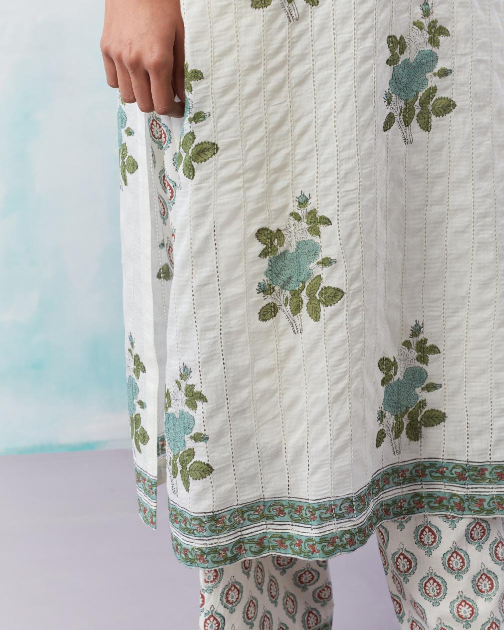 Off white cotton hand block printed straight kurta set with all-over teal green flower boota and faggoting detailing.