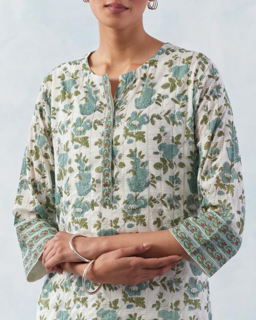 Off white cotton hand block printed straight kurta set with all-over teal green flowers and faggoting detailing.