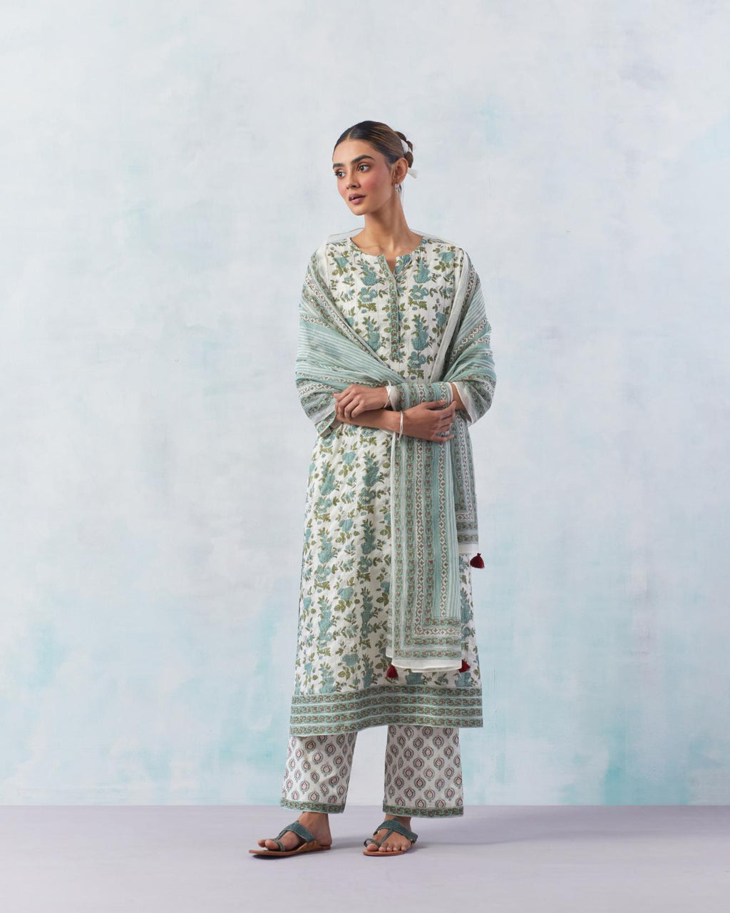 Off white cotton hand block printed straight kurta set with all-over teal green flowers and faggoting detailing.