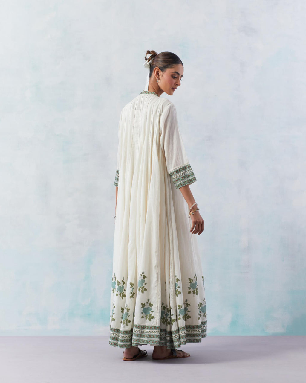 Off white cotton hand block printed multi-paneled kurta dress set with 3/4 sleeves and ladder lace detailing at all panels.