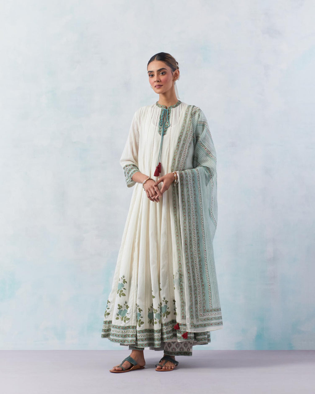 Off white cotton hand block printed multi-paneled kurta dress set with 3/4 sleeves and ladder lace detailing at all panels.