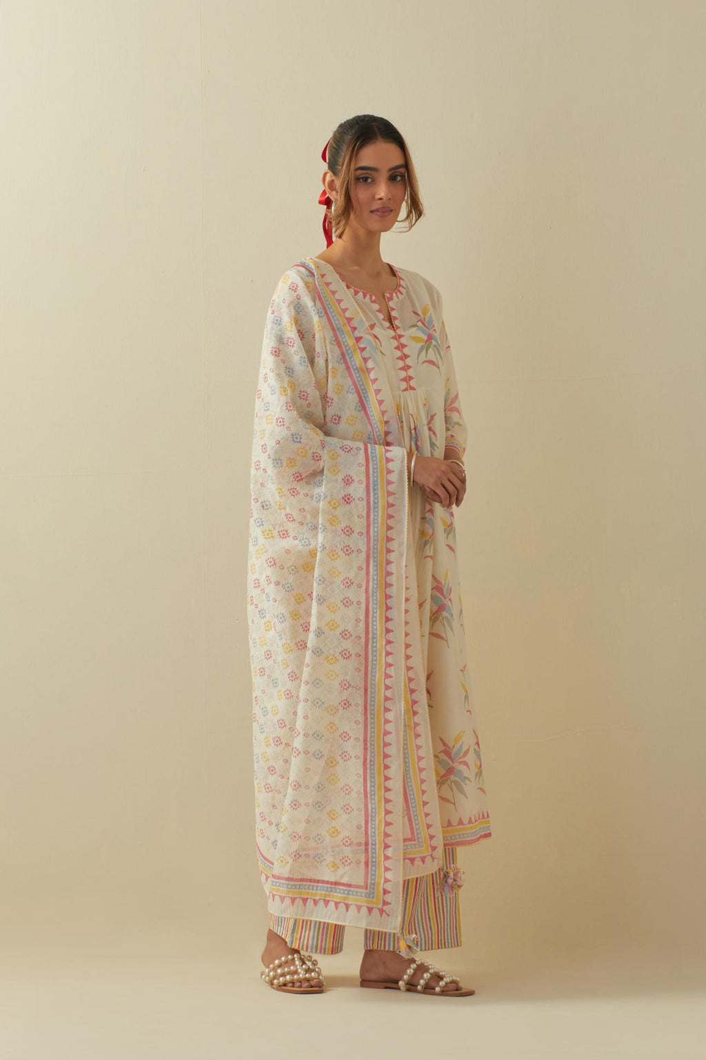 Off white cotton Chanderi straight long kurta dress set with all-over multi colored hand block printed floral boota.