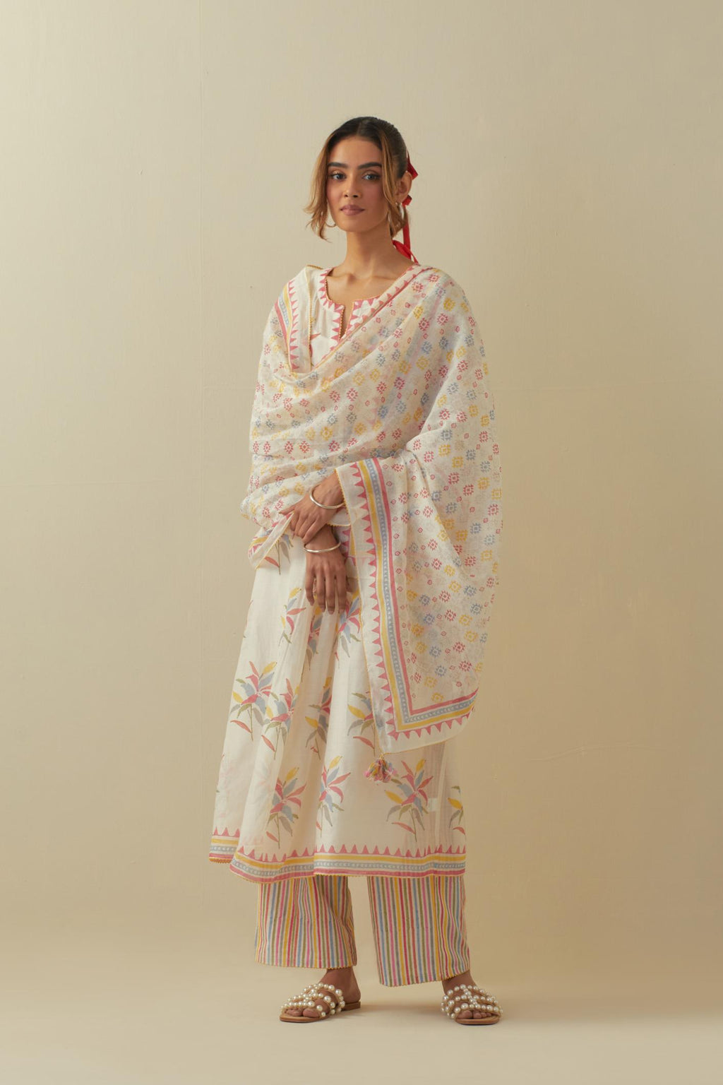 Off white cotton Chanderi straight long kurta dress set with all-over multi colored hand block printed floral boota.