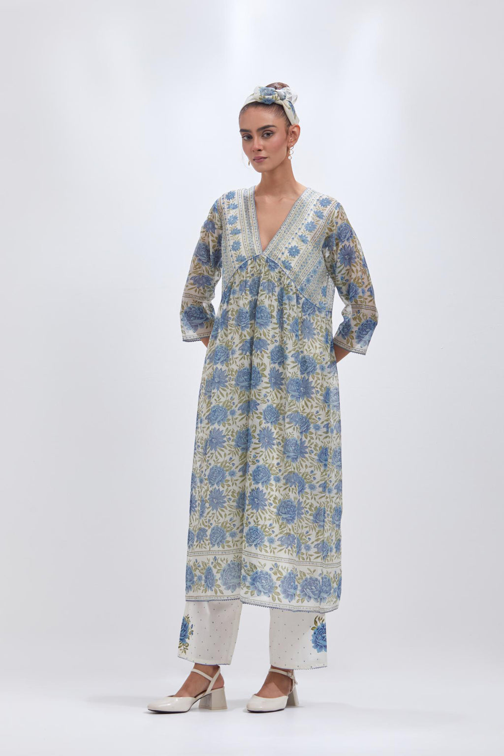 Off white cotton chanderi kurta dress set with all-over blue & green floral hand block print.