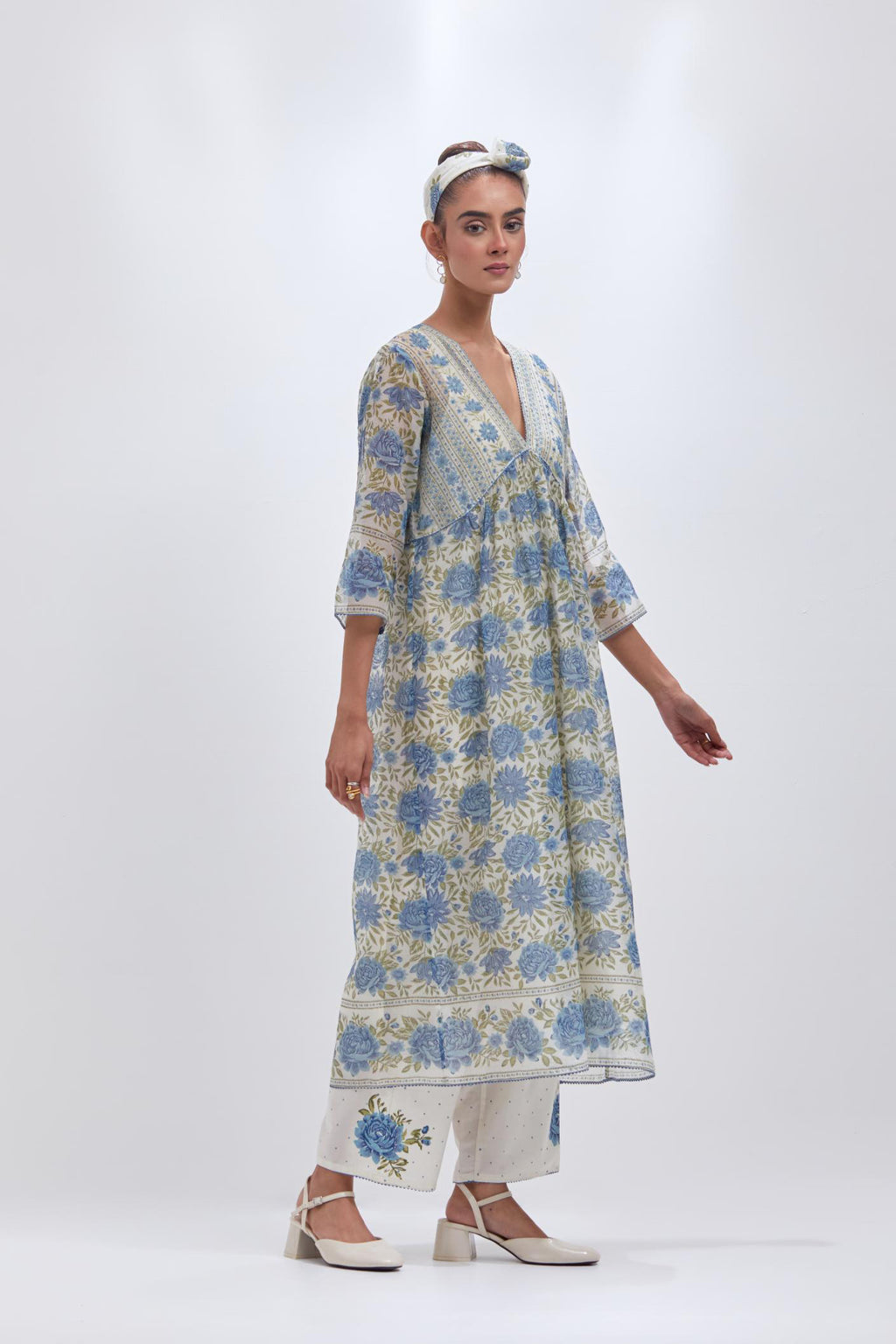 Off white cotton chanderi kurta dress set with all-over blue & green floral hand block print.