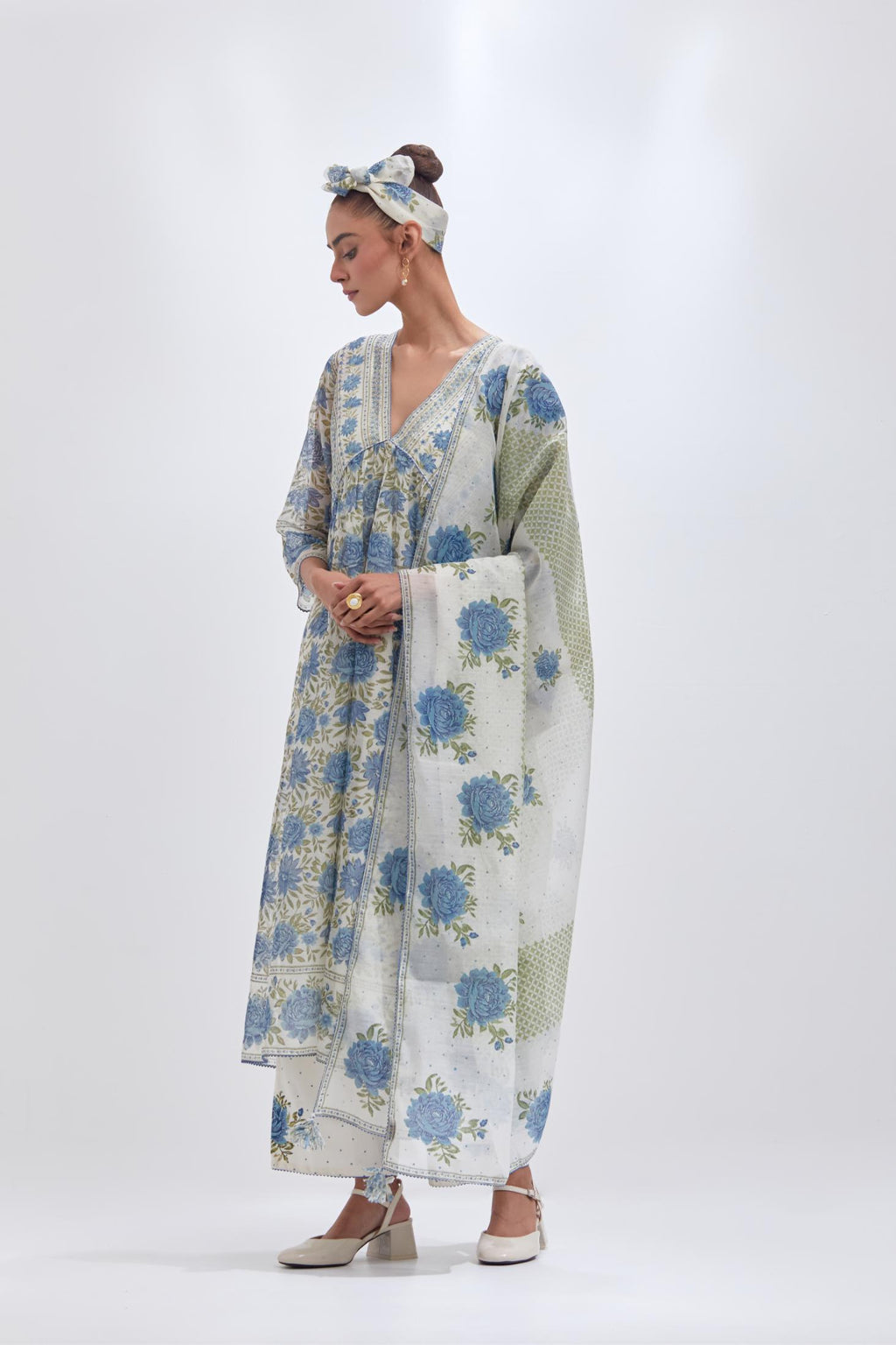 Off white cotton chanderi dupatta with all-over blue & green hand block print.