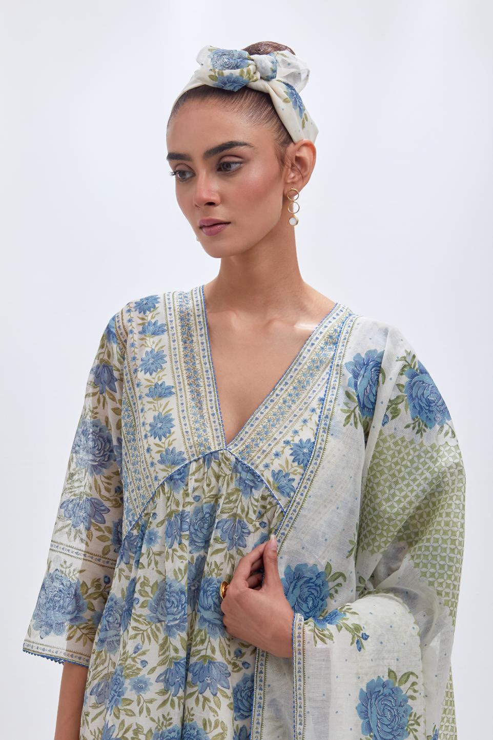 Off white cotton chanderi dupatta with all-over blue & green hand block print.