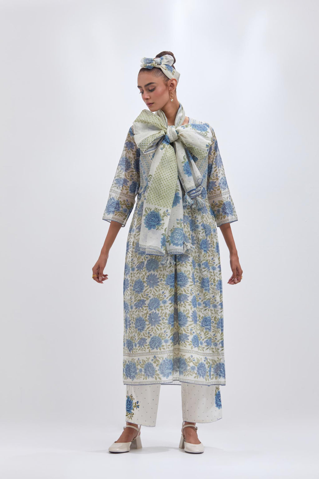 Off white cotton chanderi dupatta with all-over blue & green hand block print.