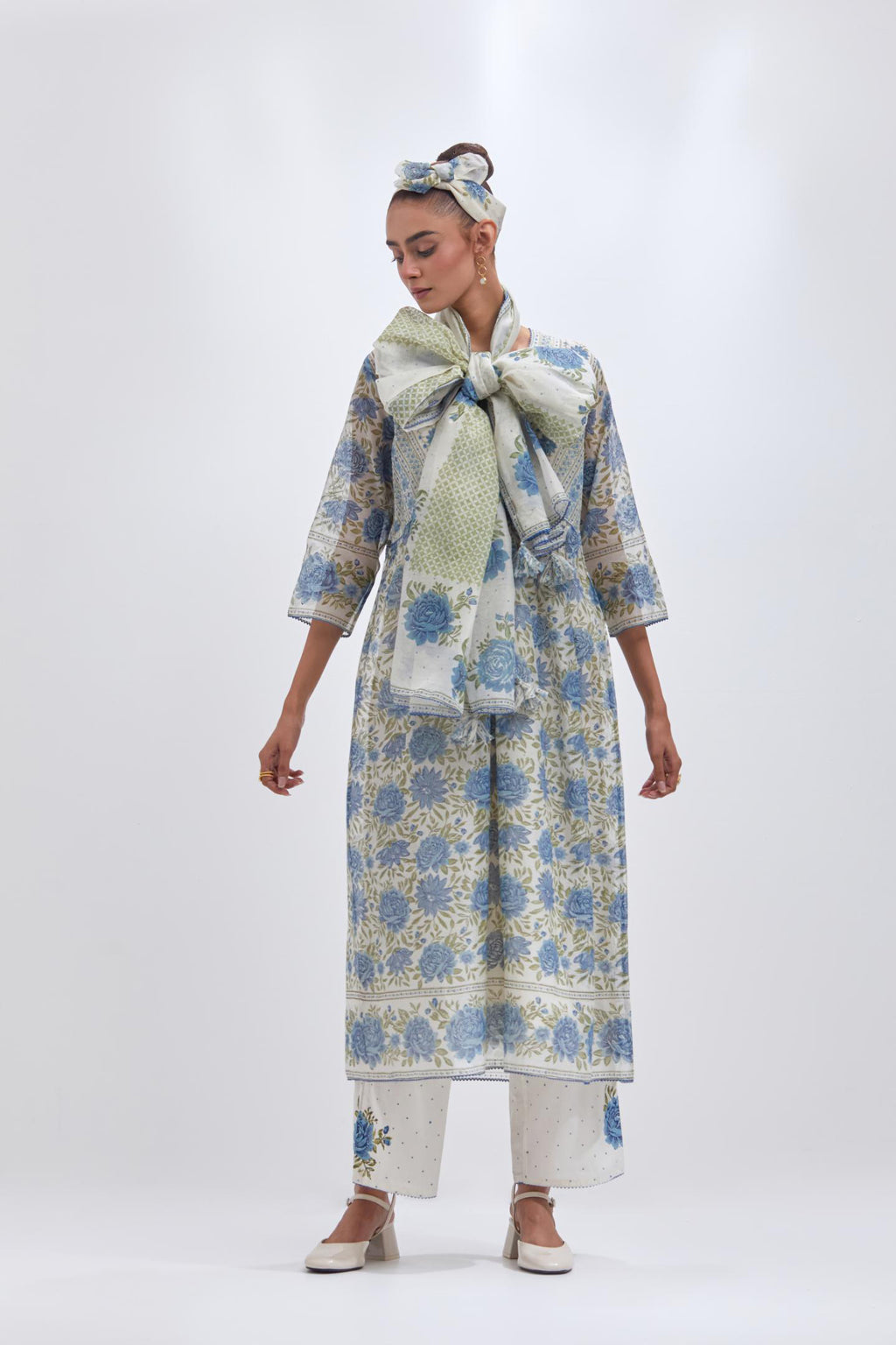 Off white cotton chanderi kurta dress set with all-over blue & green floral hand block print.