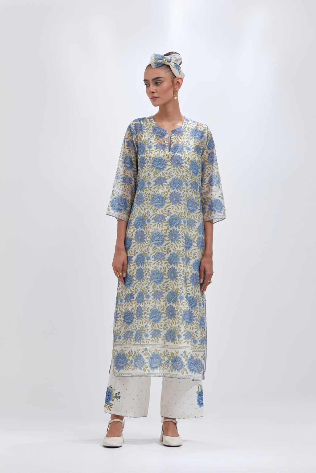 Off white cotton chanderi straight kurta set with all-over blue and green floral hand block print.