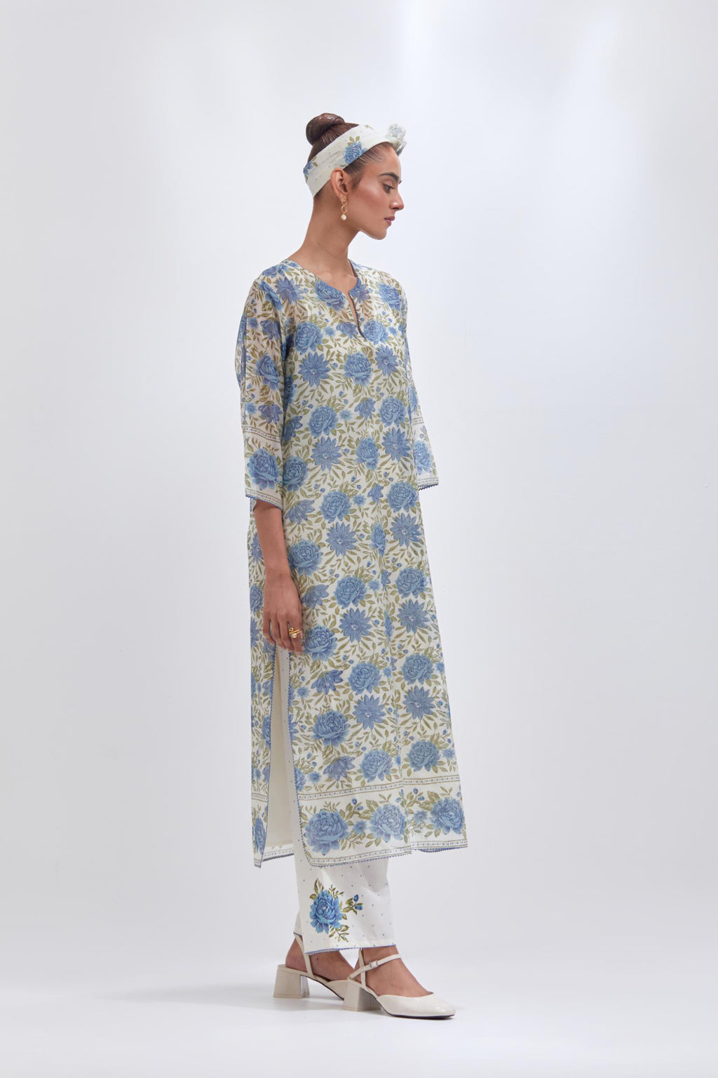 Off white cotton chanderi straight kurta set with all-over blue and green floral hand block print.